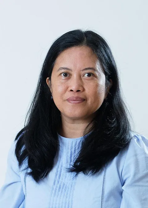 Dr. Tioria Sihombing